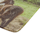 Schöne Pferde laufen Schneidebrett (Ecke)