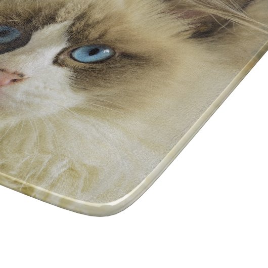 Schöne Ragdoll Katze mit blauen Augen Schneidebrett (Ecke)