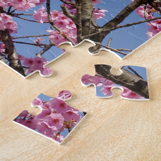 Schöne rosa Kirschblüten und blauer Himmel Puzzle (Seite)