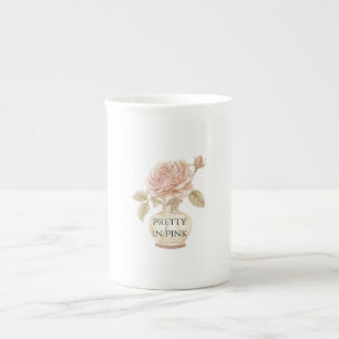Schöne rosa Rosenblume in der Vase Porzellantasse