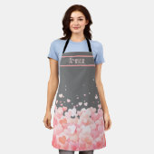 Schöne rosa, schwebende Herzen auf dunkelgrau Schürze (Getragen)
