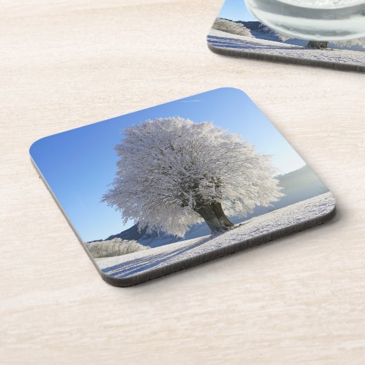 Schöne schneebedeckte Baumwinterlandschaft Getränkeuntersetzer (Linke Seite)
