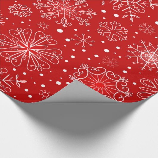 Schöne Schneeflocken am Roten Hintergrund Weihnach Geschenkpapier (Ecke)