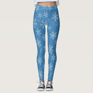 Schöne Schneeflocken auf blauen Leggings