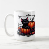 Schöne schwarze Kätzchen mit Kürbiskuiten Kaffeetasse (Links)