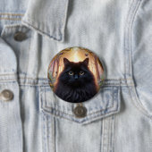Schöne schwarze Katze mit goldenen Augen Button (Beispiel)
