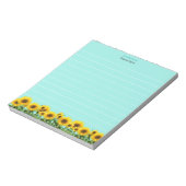 Schöne Sonnenblumen auf himmelblauem Notizblock mi (Rotiert)