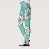 Schöne türkisfarbene große weiße Blume Leggings (Links)