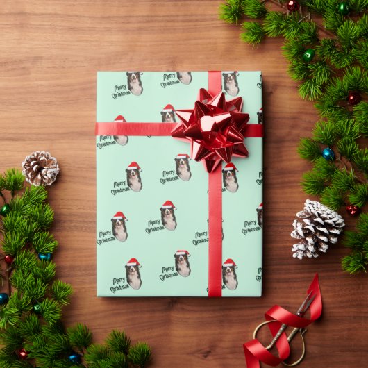 Schöner Berner Hund in der Weihnachtsmannmütze Geschenkpapier (Feiertagsgeschenk)