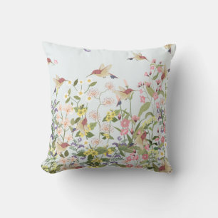 Schöner Kolibri in einer blumengeschmückten Blum Kissen