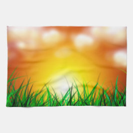 Schöner Sonnenaufgang über einem Grasfeld Geschirrtuch