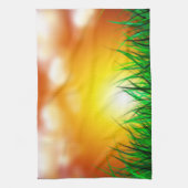 Schöner Sonnenaufgang über einem Grasfeld Geschirrtuch (Vertikal)