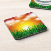 Schöner Sonnenaufgang über einem Grasfeld Getränkeuntersetzer (Linke Seite)