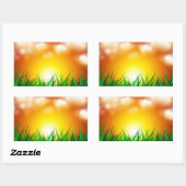 Schöner Sonnenaufgang über einem Grasfeld Rechteckiger Aufkleber (Blatt)