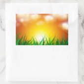 Schöner Sonnenaufgang über einem Grasfeld Rechteckiger Aufkleber (Tasche)
