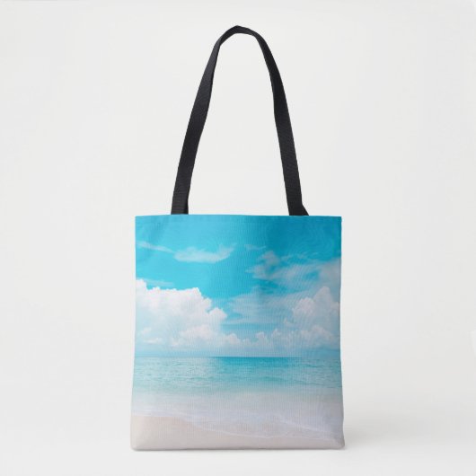 Schöner tropischer Strand mit blauem Himmel und we Tasche (Vorderseite)