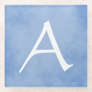 Schönes blaues Monogramm Glasuntersetzer