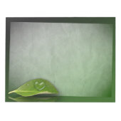 Schönes, herzförmiges Wassertropfen auf der linken Notizblock (Vorderseite)