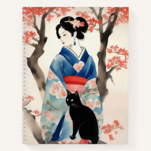Schönes japanisches Mädchen mit einem Black Cat Jo Notizblock