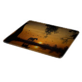 Schönes Pferd und Sonnenuntergang mit Wasser Land Schneidebrett (Ecke)