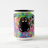 Schönes Regenbogenschaf der Familie Tasse (Zentrum)