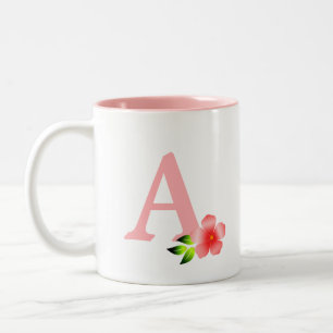 Schönes rosa Monogramm mit weißer Blume Zweifarbige Tasse