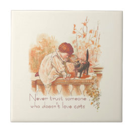 Schönes, rot gekleidetes Kind mit Kätzchen Zitat Fliese