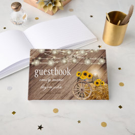 Schönes Rustikales Holzfass mit Sonnenblumen Gästebuch