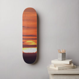 Schönes Sonnenuntergang-Foto Skateboard