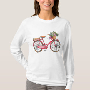 Schönes Vintages Rotes Bike mit einem Korb voll T-Shirt