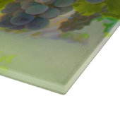 Schönes Weinglas und Weintrauben Schneidebrett (Ecke)