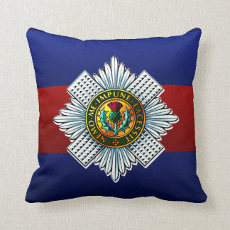 Schotte-Schutz behält Ruhe und Hirsch auf Kissen