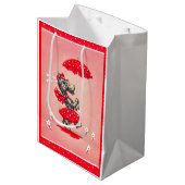 Schottische Hundedame mit Schirm Mittlere Geschenktüte (Vorderseite Schrägansicht)