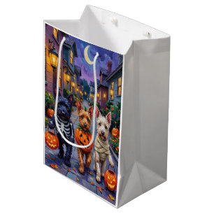 Schottische Terrier-Hunde in Halloween-Kostümen Mittlere Geschenktüte