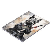 Schottische Terrier spielen Bagpipe in einer Kilot Notizblock (Linke Seite)