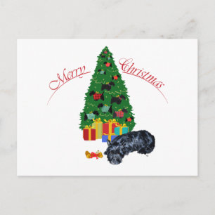 Schottischer Terrier hält Weihnachtsfest Feiertagspostkarte