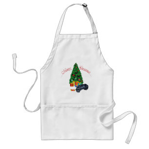 Schottischer Terrier hält Weihnachtsfest Schürze