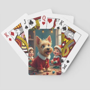 Schottischer Terrier hilft Weihnachtsmännern Spielkarten