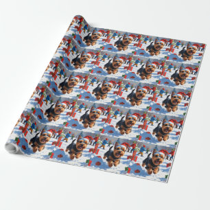 Schottischer Terrier läuft durch Schnee mit Weihna Geschenkpapier