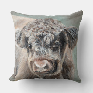 Schottisches Highland-Kalb auf grünem Grund Kissen