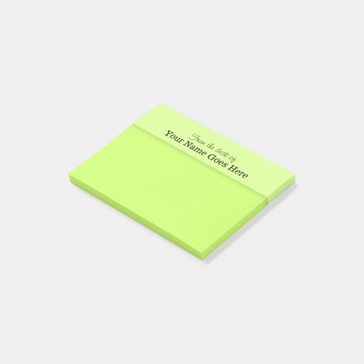 SCHREIBTISCH-Anmerkungsorganisator der grünen Post-it Klebezettel (angewinkelt)