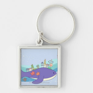 Schule der Fische, die in der Unterwasserstadt Schlüsselanhänger