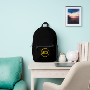 Schulfarben und -buchstaben in Schwarz und Gold Bedruckter Rucksack