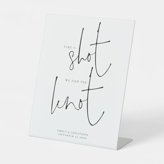 Schuss, den wir an die Knotehe geben Sockelschild (Vorderseite)