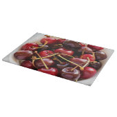 Schüssel mit Kirschen Schneidebrett (Ecke)