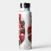 Schüssel mit Kirschen Trinkflasche (rechts)