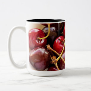 Schüssel mit Kirschen Zweifarbige Tasse