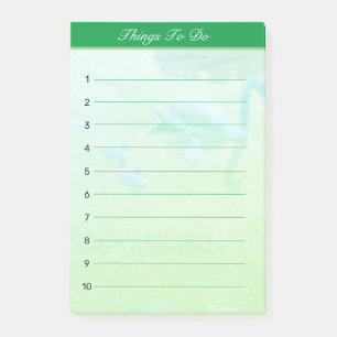 Schwanensee-Dinge, die auf smaragdgrünem Hintergru Post-it Klebezettel