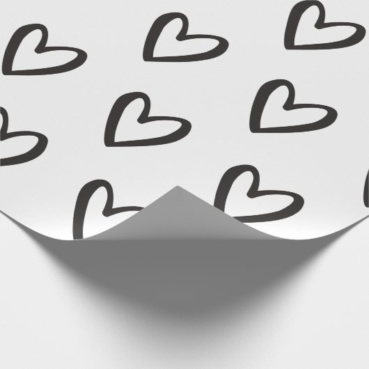 Schwarz auf weißem, handgezeichnetem Herzen Geschenkpapier (Ecke)