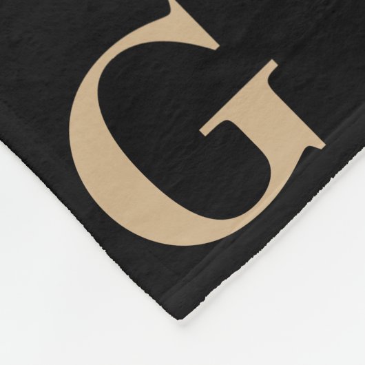 Schwarz-Beige-Monogramm-Muster Fleecedecke (Ecke)